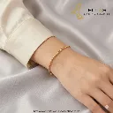 Pulsera Espiral de Oro Oro Laminado 18K Dorado, Largo 16 cm Ancho 0.2 cm, Extensión 0.3 cm perso.webp